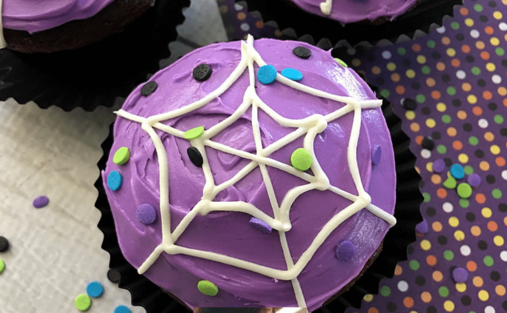 Deliciously Spooky Spider Web Cupcakes
