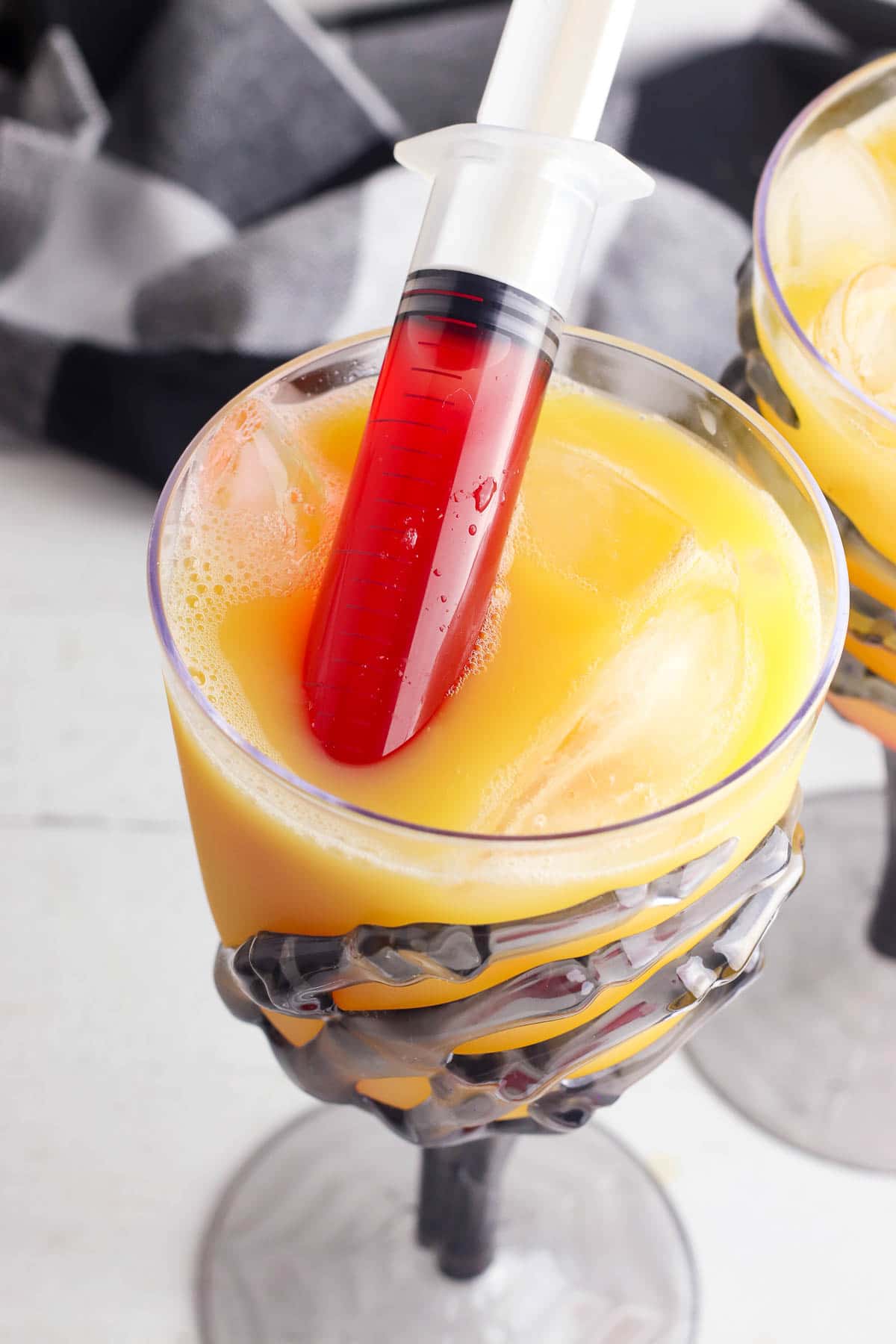 tequila-sunrise-cocktail-with-sryinge-